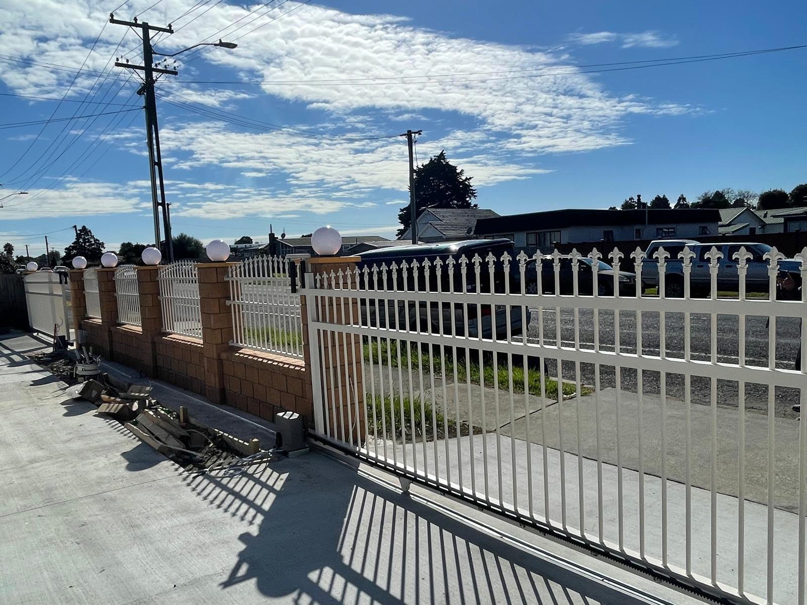 Automated Sliding Driveway Gate and Brick Pillars