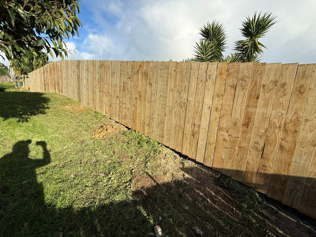 Stepped Timber Fence on Slope